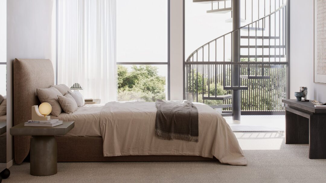 Interior render of a Ralph Alexandria bedroom, with a balcony and a curved stair beyond full-height glazing.